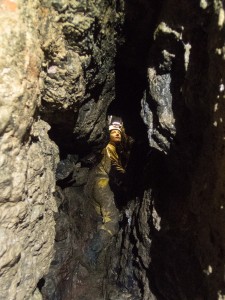 Sarah Payne in a natural rift broken into by the miners. Photo by Duncan Simey