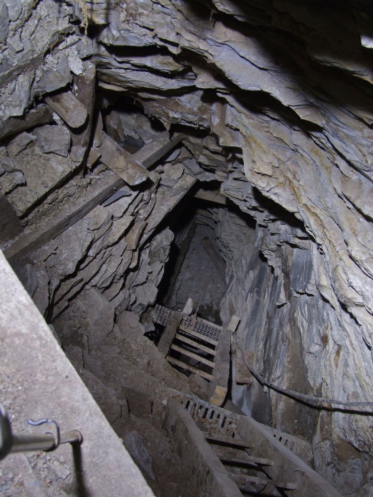 Ladderway to deep adit, Talybont Mine. The subject of Roy Fellows' stabilisation work 2015-16, including the concrete lintel visible bottm left, and the wall below that. Photo: Roy Fellows. 