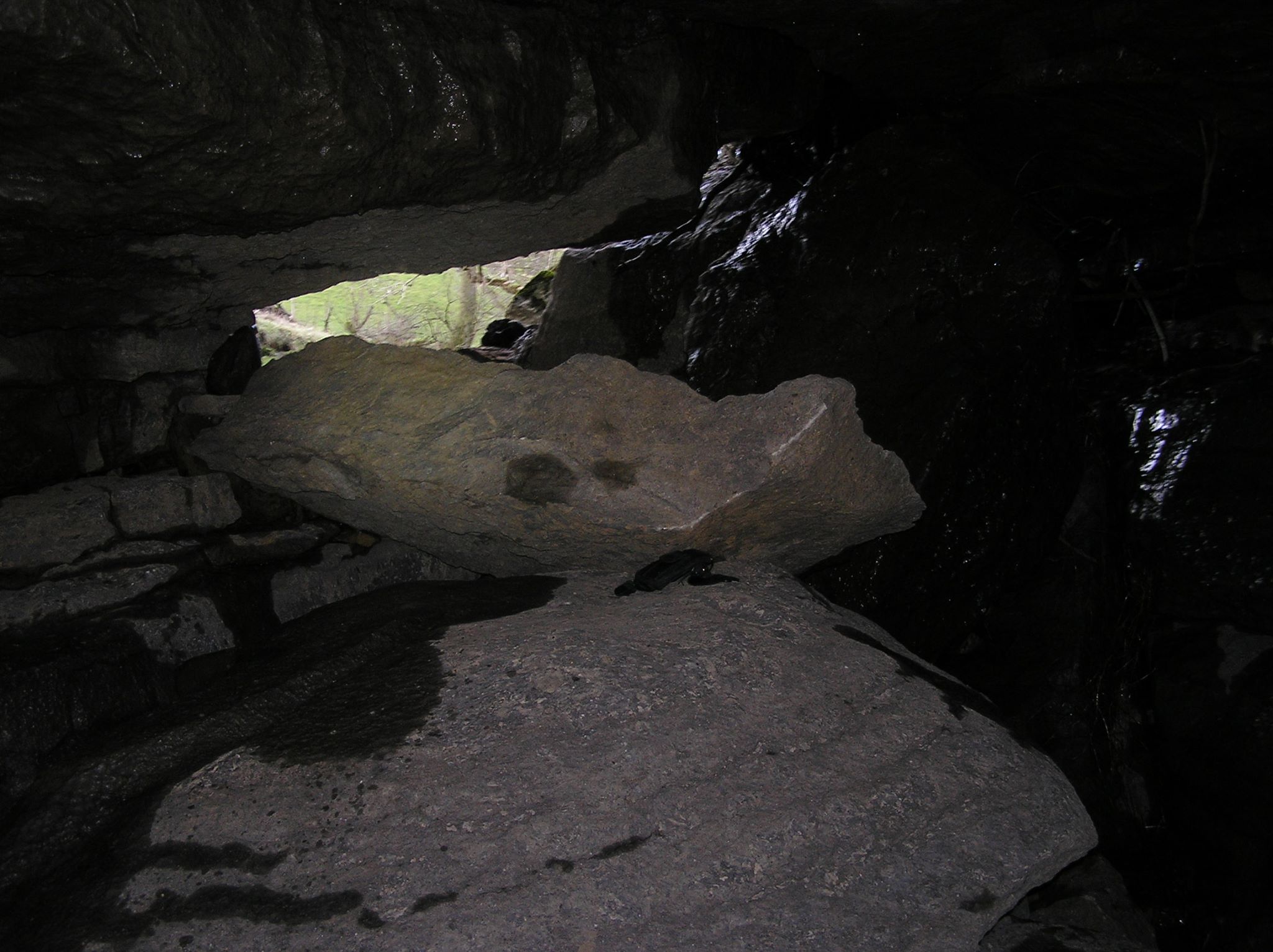 Fallen boulders in the entrance to Goyden Pot. Photo: Chris Fox, Black Sheep Diggers 